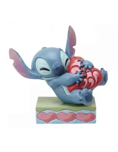 Figura enesco disney stitch abrazando un corazón
