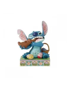 Figura enesco diseny stitch comiendo conejo de chocolate con huevos