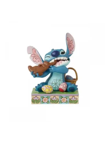 Figura enesco diseny stitch comiendo conejo de chocolate con huevos